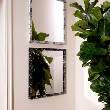 Reflection of Eccentricity Black Frame Mirror